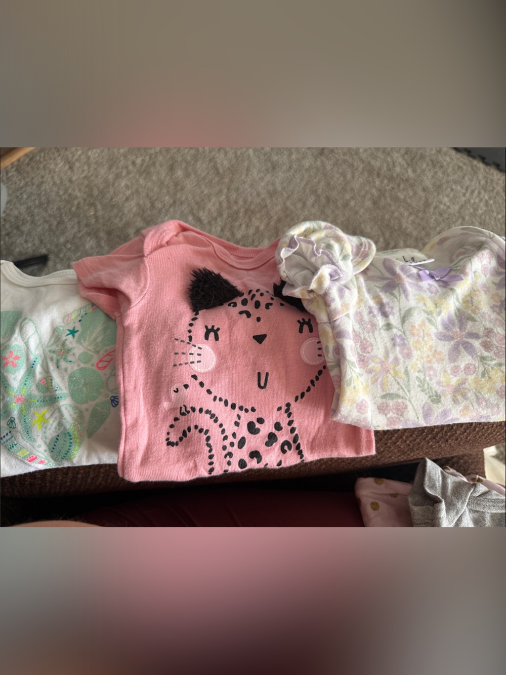 Bundle of onesies and sleepers